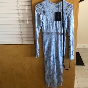 Dusty blue long sleeve body con dress